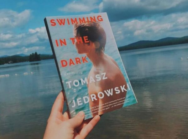 Swimming in the Dark by Tomasz Jedrowski